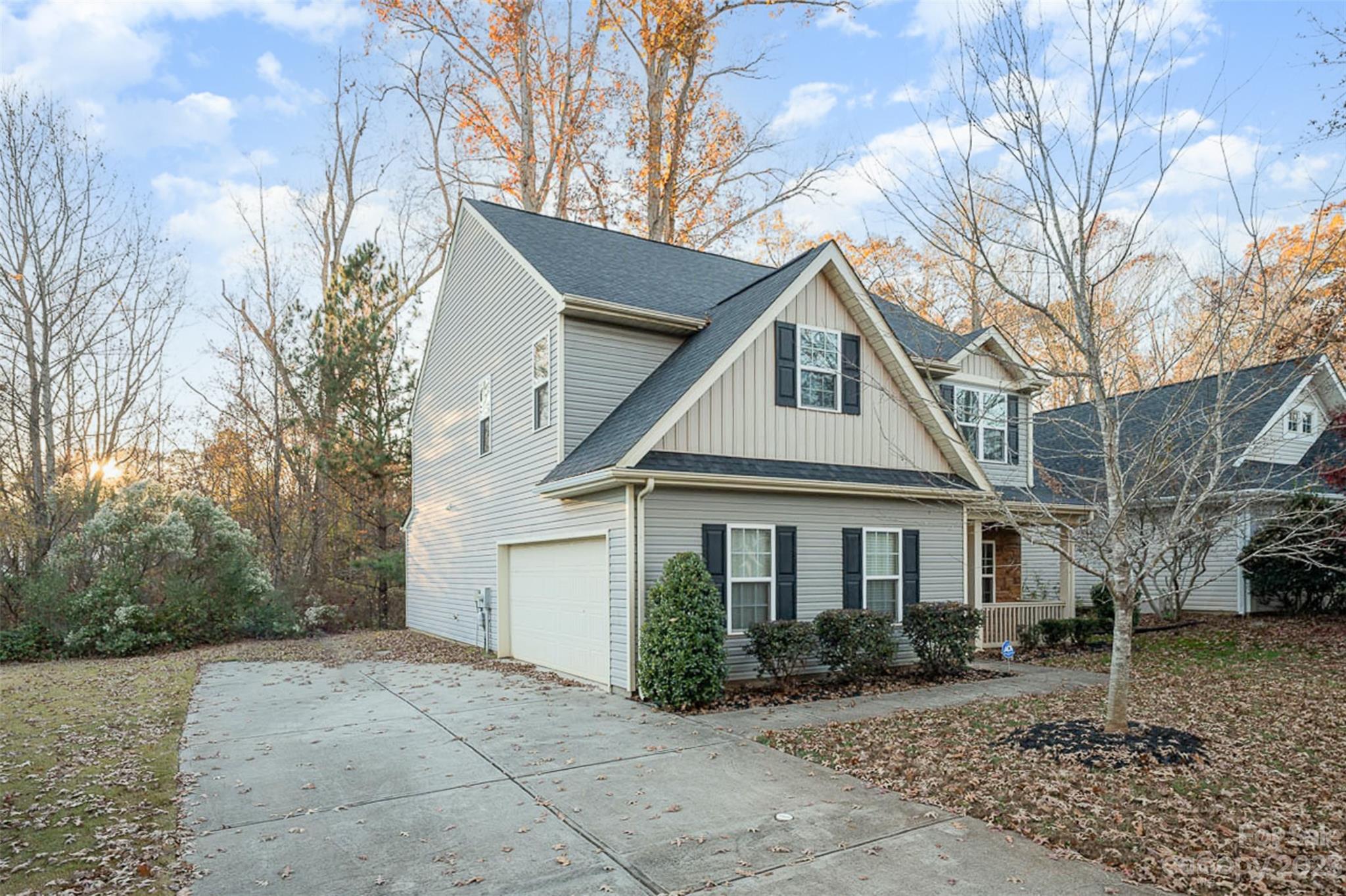 13225 Chelsea Ridge Lane Huntersville, NC 28078 - Photo 30 of 40 a front view of a house with a yard