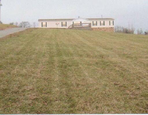 681 Dusty Rock Road Northwest Riner, VA 24149 - Photo 1 of 1 a building with a ocean in the background