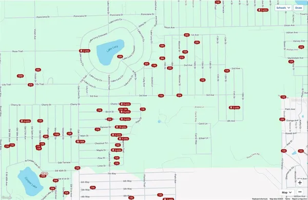 a white cabinet sitting next to a white wall