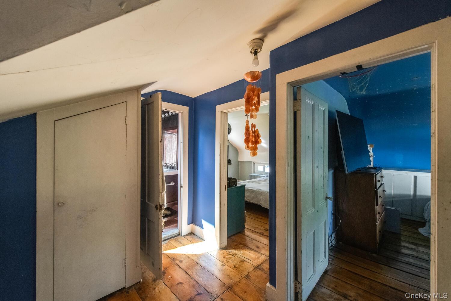 88 South Hamilton Street Poughkeepsie, NY 12601 - Photo 28 of 47 Hall with wood flooring and vaulted ceiling