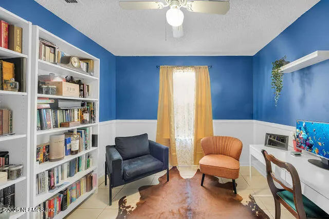 a house with trees in the background