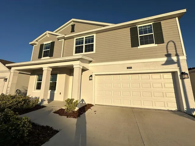 a front view of a house with a outdoor space
