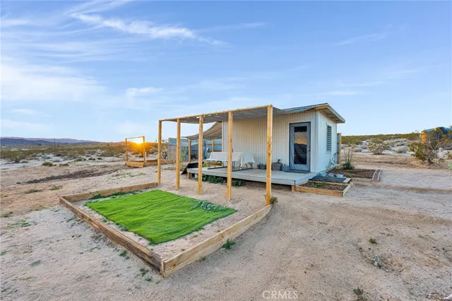 a view of a backyard with a patio
