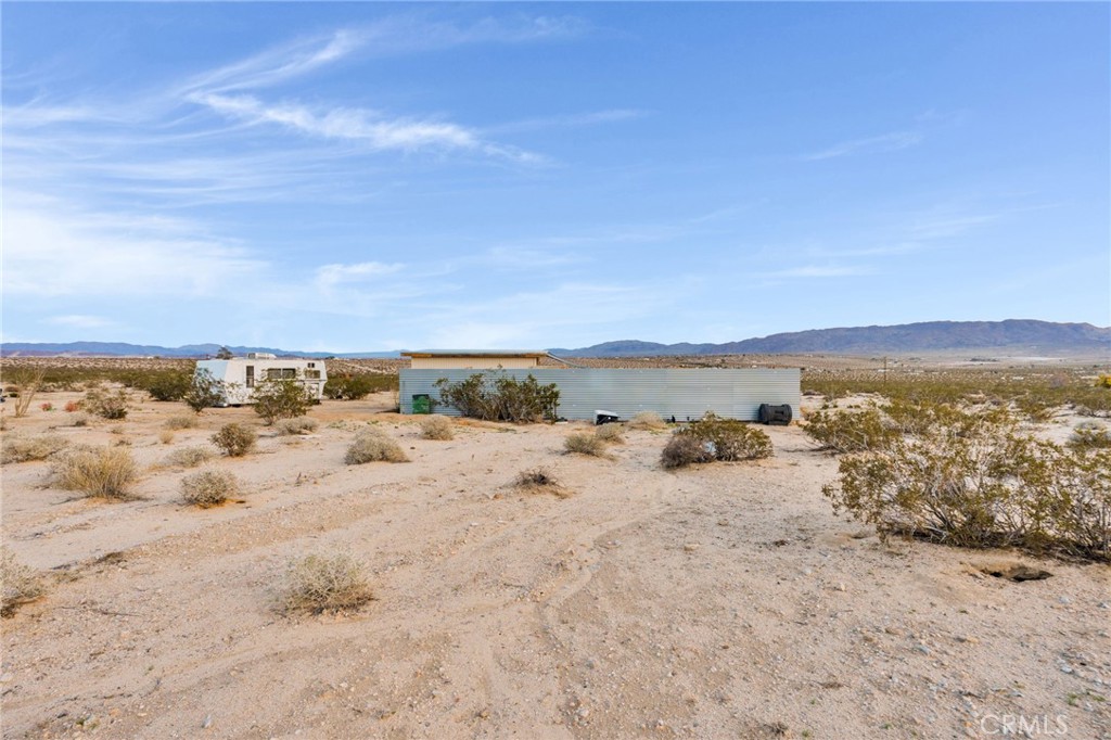 68476 Pole Line Road Twentynine Palms, CA 92277 - Photo 16 of 25 a view of swimming pool with an ocean view