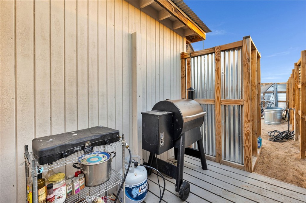 68476 Pole Line Road Twentynine Palms, CA 92277 - Photo 5 of 25 a view of a chairs and table in the balcony