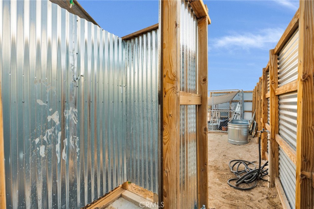 68476 Pole Line Road Twentynine Palms, CA 92277 - Photo 6 of 25 a bathroom with a shower curtain