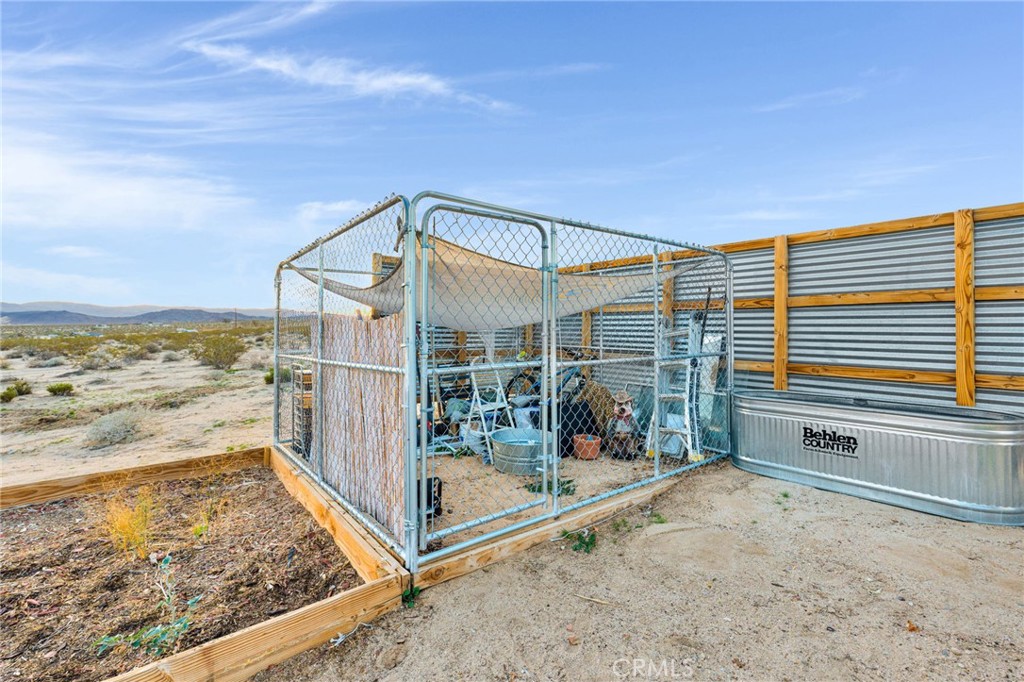 68476 Pole Line Road Twentynine Palms, CA 92277 - Photo 8 of 25 a view of a house with a ocean view