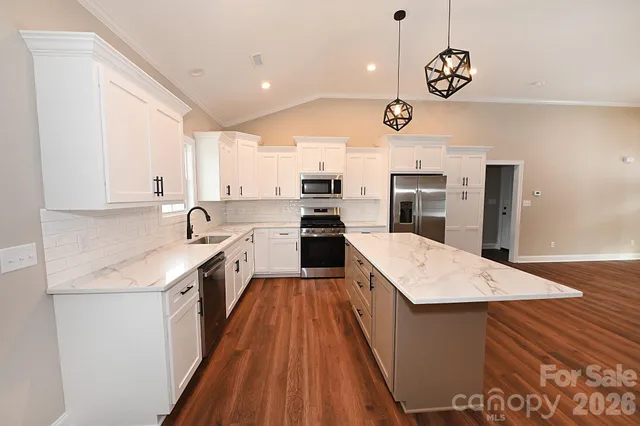 a bathroom with a shower and toilet
