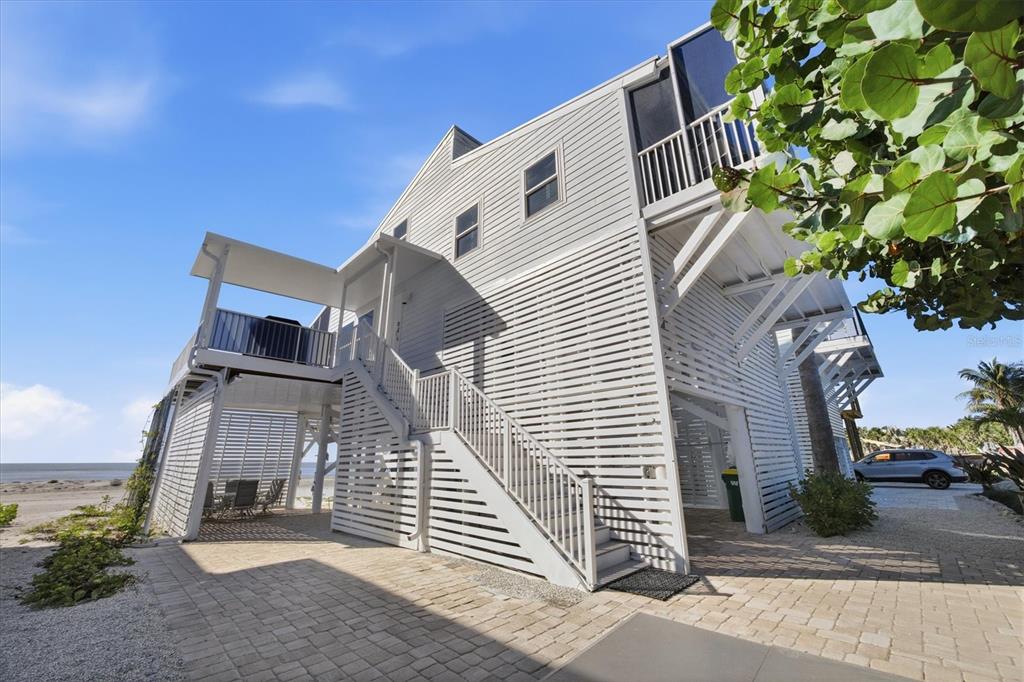 33 South Gulf Boulevard, Unit A Boca Grande, FL 33921 - Photo 11 of 47 a view of a house with a yard