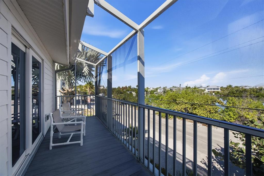 33 South Gulf Boulevard, Unit A Boca Grande, FL 33921 - Photo 17 of 47 a view of a city from a balcony