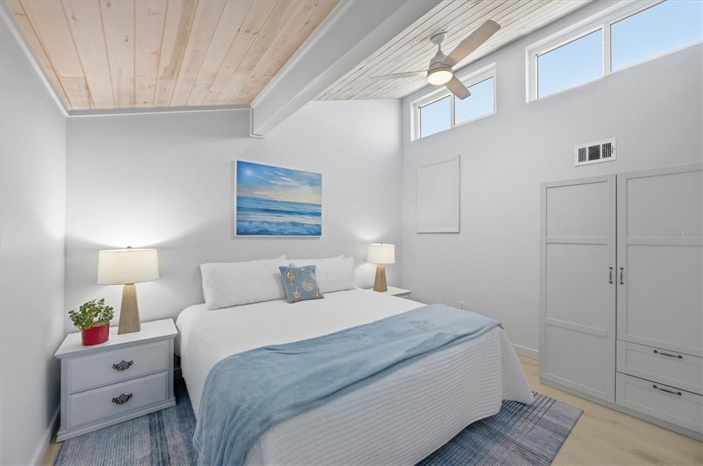 33 South Gulf Boulevard, Unit A Boca Grande, FL 33921 - Photo 31 of 47 a bedroom with a bed and a night stand