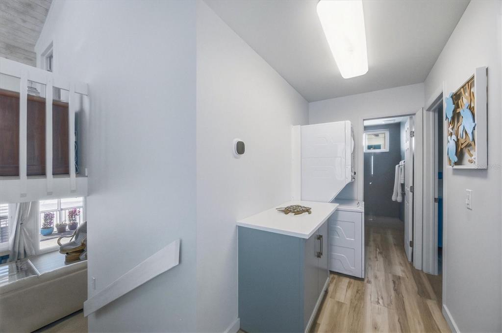 33 South Gulf Boulevard, Unit A Boca Grande, FL 33921 - Photo 37 of 47 a hallway with cabinets