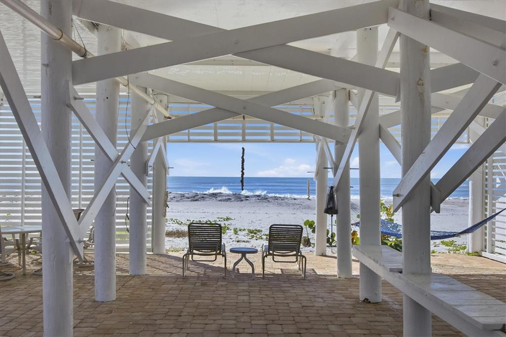 33 South Gulf Boulevard, Unit A Boca Grande, FL 33921 - Photo 40 of 47 a view of a livingroom with furniture staircase and front view of a house