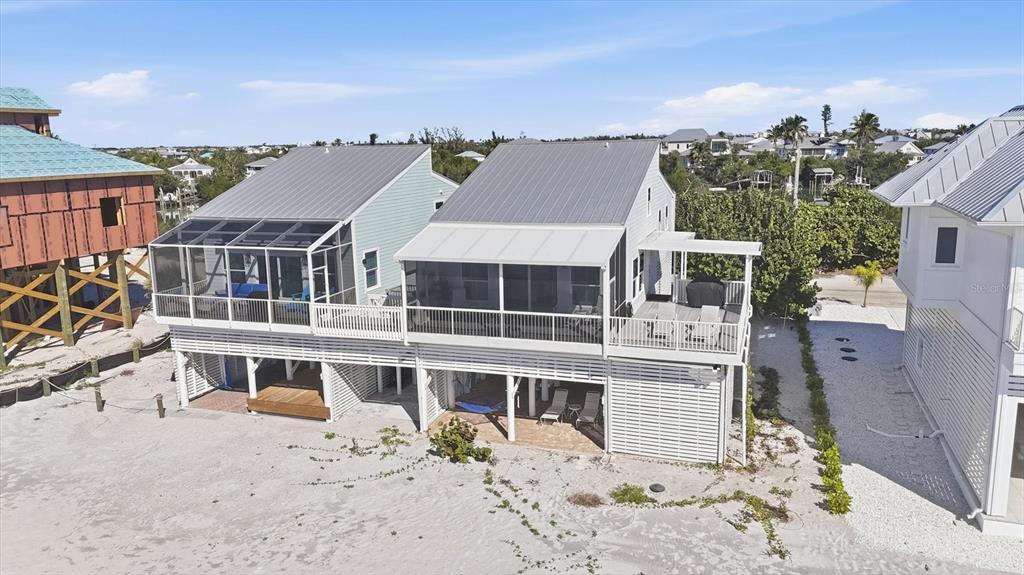 33 South Gulf Boulevard, Unit A Boca Grande, FL 33921 - Photo 45 of 47 a view of a large white building