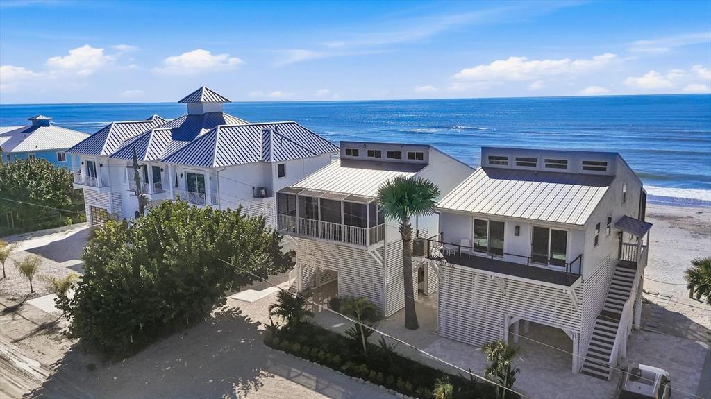 33 South Gulf Boulevard, Unit A Boca Grande, FL 33921 - Photo 47 of 47 a front view of a house with a yard