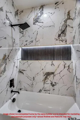 a picture of a bathroom with a sink and a mirror