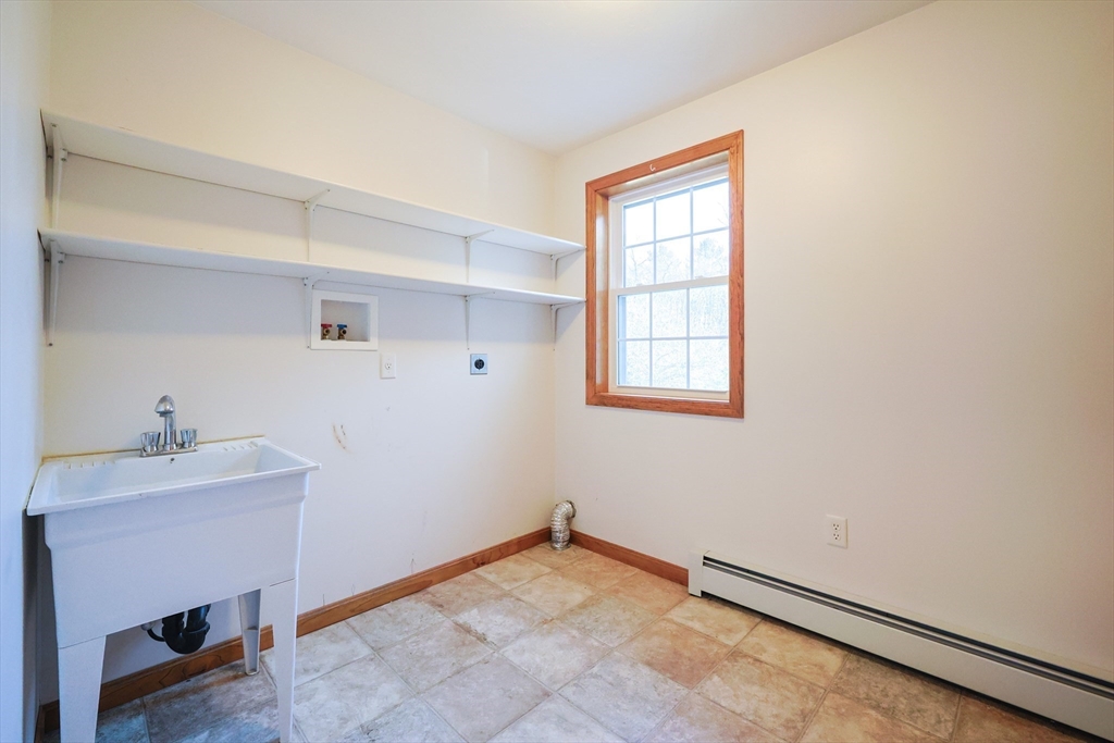 1380 North Brookfield Road Oakham, MA 01068 - Photo 21 of 37 a view of an empty room with a window