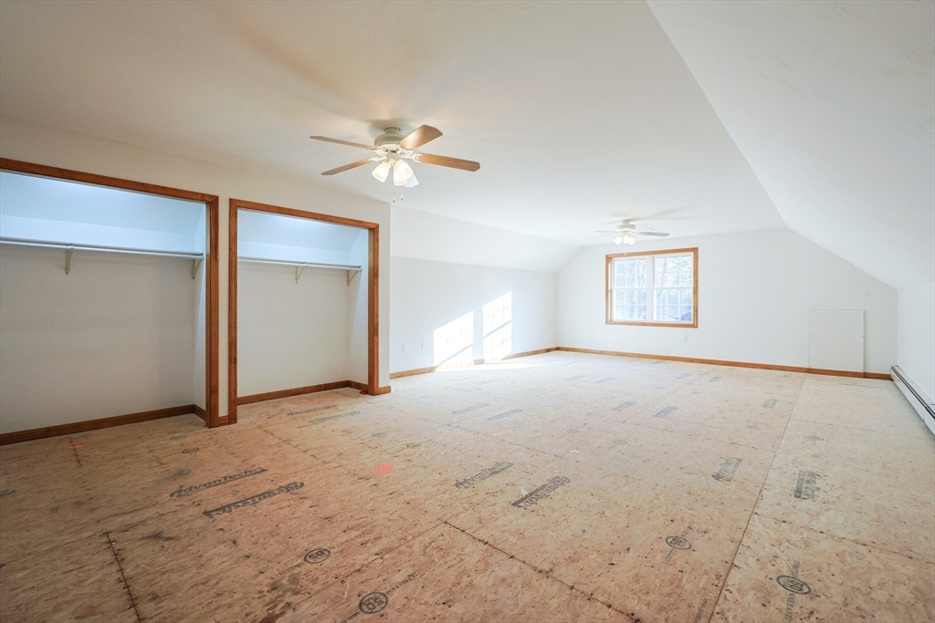 1380 North Brookfield Road Oakham, MA 01068 - Photo 26 of 37 a view of empty room with windows
