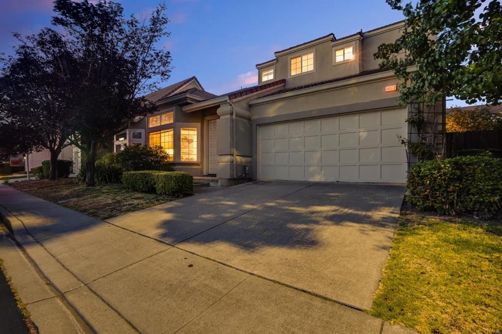 34372 Eucalyptus Terrace Fremont, CA 94555 - Photo 1 of 40 a view of a house with a yard and garage