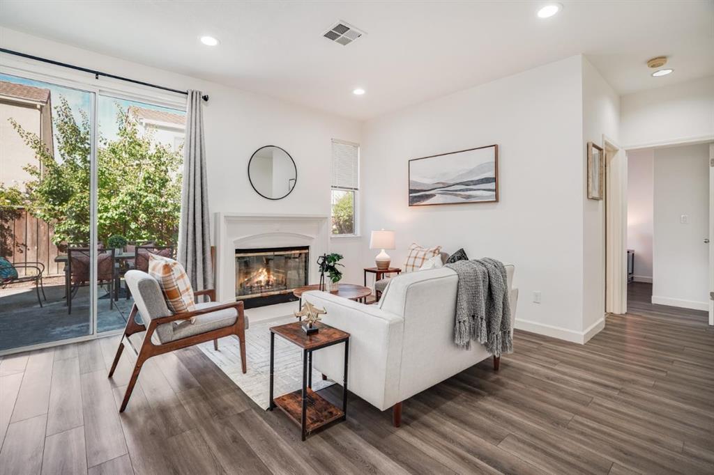 34372 Eucalyptus Terrace Fremont, CA 94555 - Photo 11 of 40 a living room with furniture and a fireplace