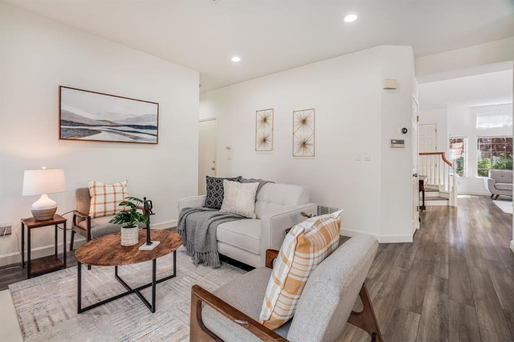 34372 Eucalyptus Terrace Fremont, CA 94555 - Photo 12 of 40 a living room with furniture and a wooden floor