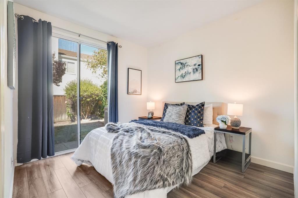 34372 Eucalyptus Terrace Fremont, CA 94555 - Photo 22 of 40 a bedroom with a bed and a large window