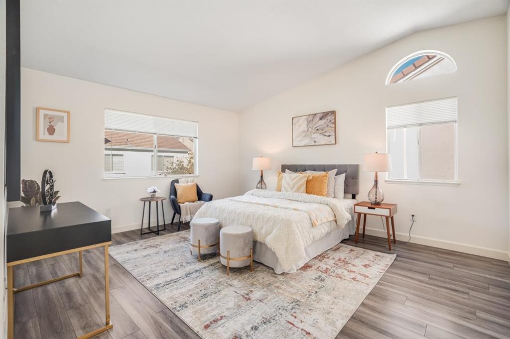 34372 Eucalyptus Terrace Fremont, CA 94555 - Photo 25 of 40 a bedroom with a bed and wooden floor