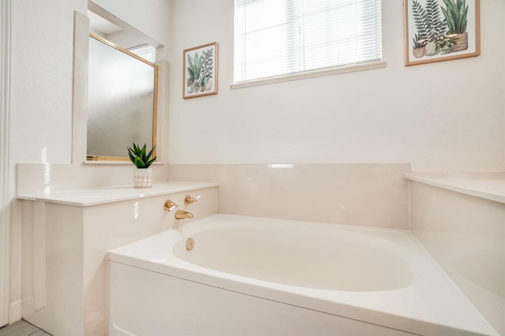 34372 Eucalyptus Terrace Fremont, CA 94555 - Photo 28 of 40 a white bath tub sitting next to a white sink