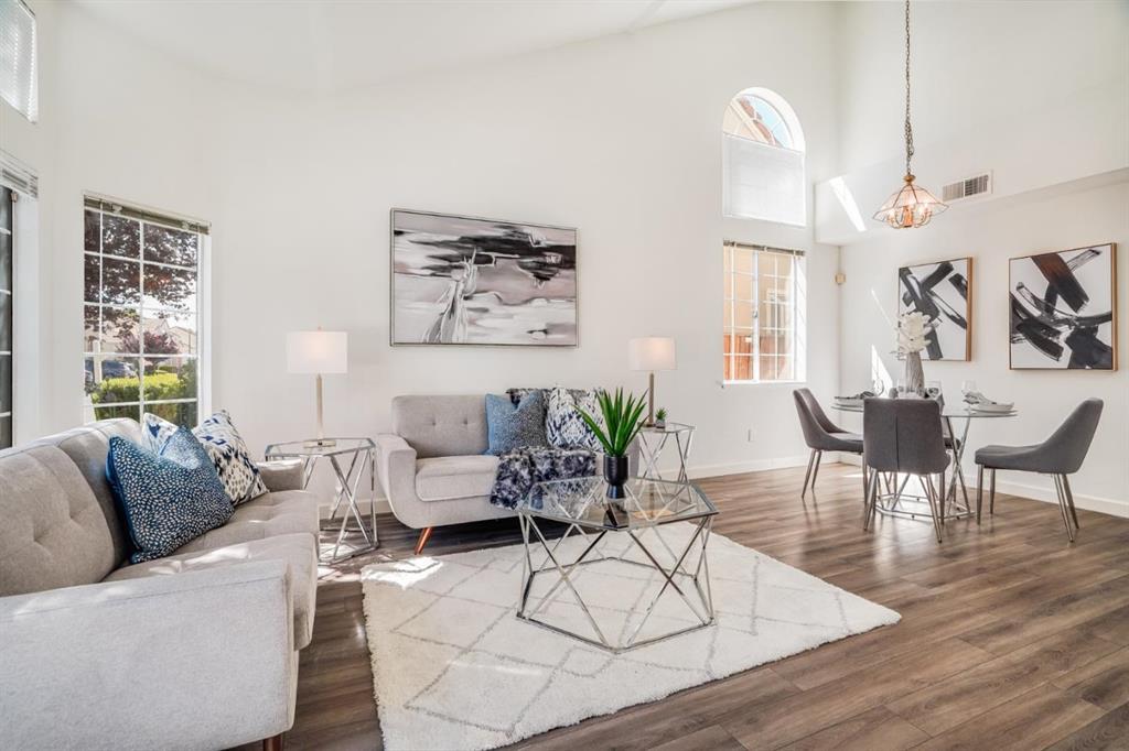 34372 Eucalyptus Terrace Fremont, CA 94555 - Photo 9 of 40 a living room with furniture and wooden floor