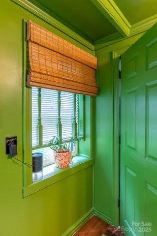 a bathroom with a granite countertop sink and a large mirror