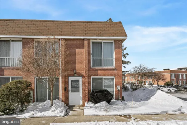 a front view of a house with yard