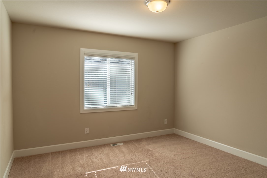 17317 40th Avenue Southeast Bothell, WA 98012 - Photo 13 of 24 an empty room with a window