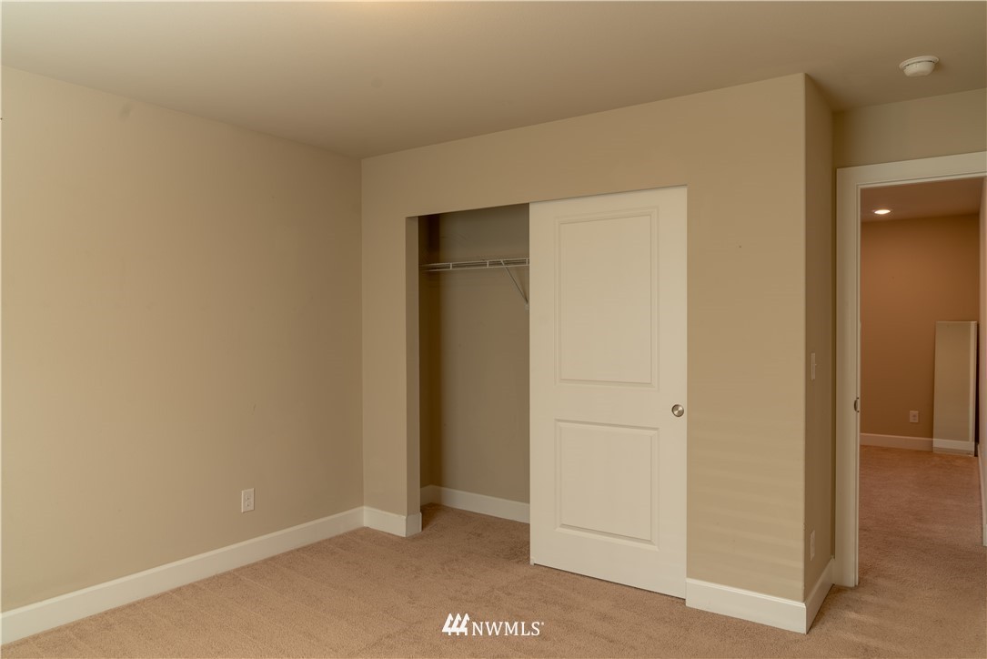 17317 40th Avenue Southeast Bothell, WA 98012 - Photo 14 of 24 an empty room with closet
