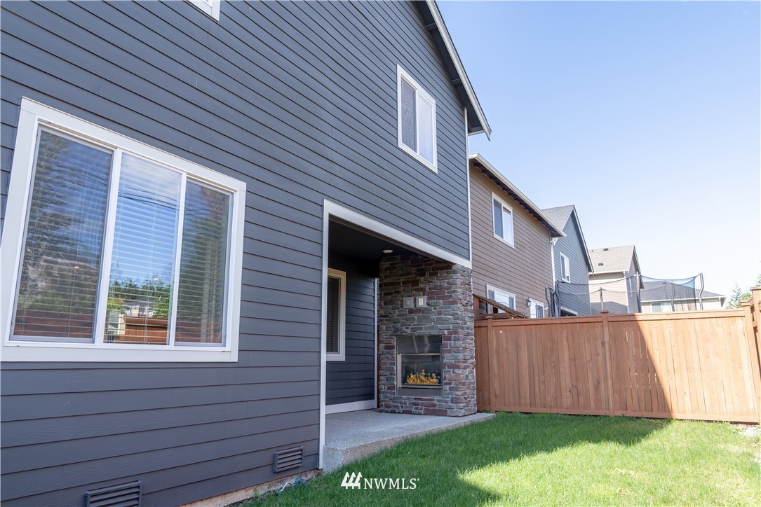 17317 40th Avenue Southeast Bothell, WA 98012 - Photo 24 of 24 a view of a house with a backyard