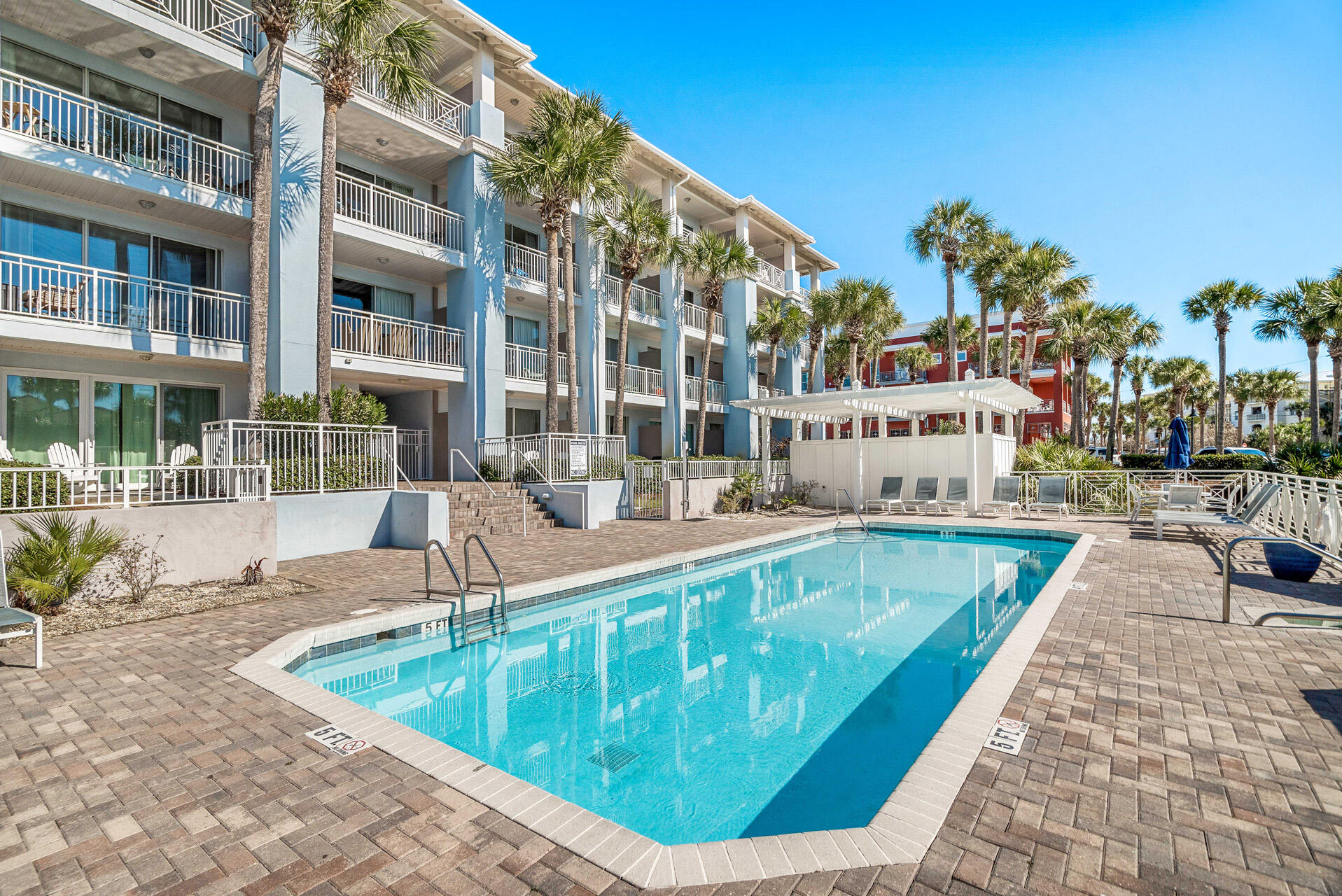 393 South Co Highway 393, Unit 108 Santa Rosa Beach, FL 32459 - Photo 27 of 39 a view of a swimming pool with a patio