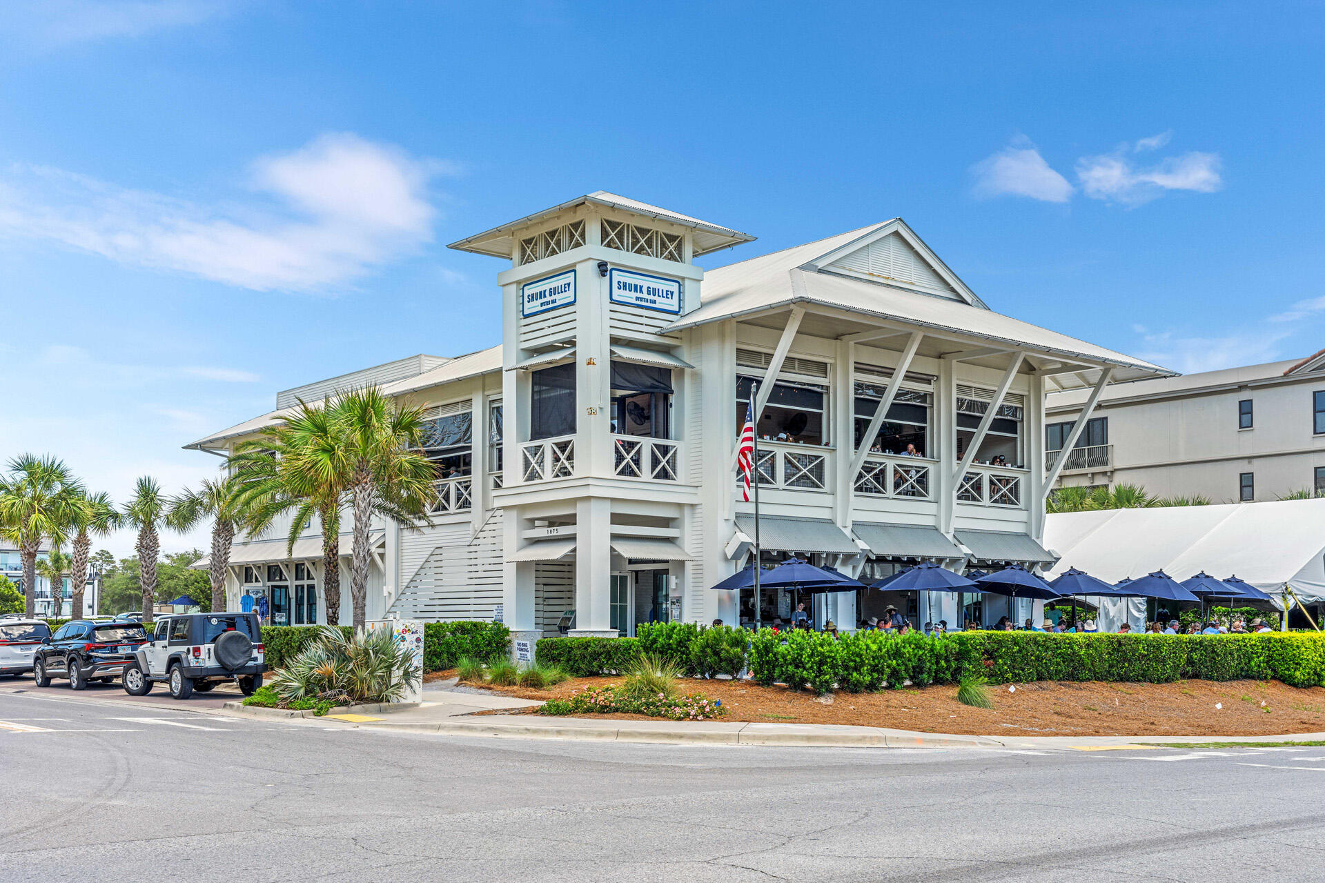 393 South Co Highway 393, Unit 108 Santa Rosa Beach, FL 32459 - Photo 36 of 39 a front view of a building with a garden and plants