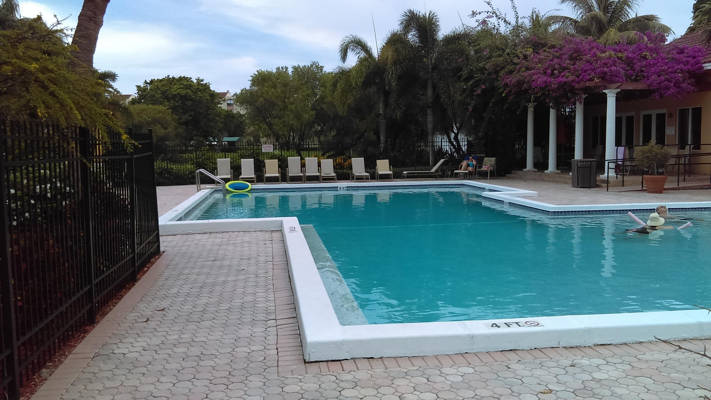 820 Lavers Circle, Unit G402 Delray Beach, FL 33444 - Photo 21 of 23 pool
