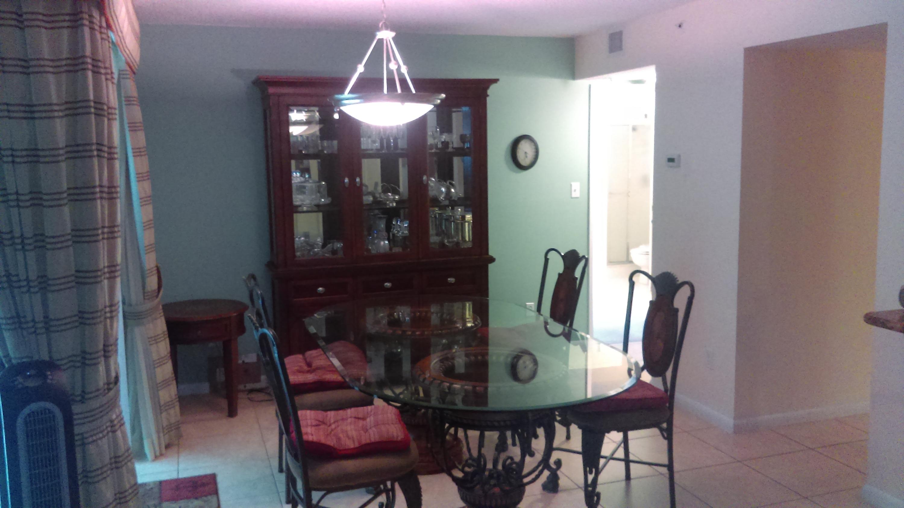 820 Lavers Circle, Unit G402 Delray Beach, FL 33444 - Photo 4 of 23 dining area