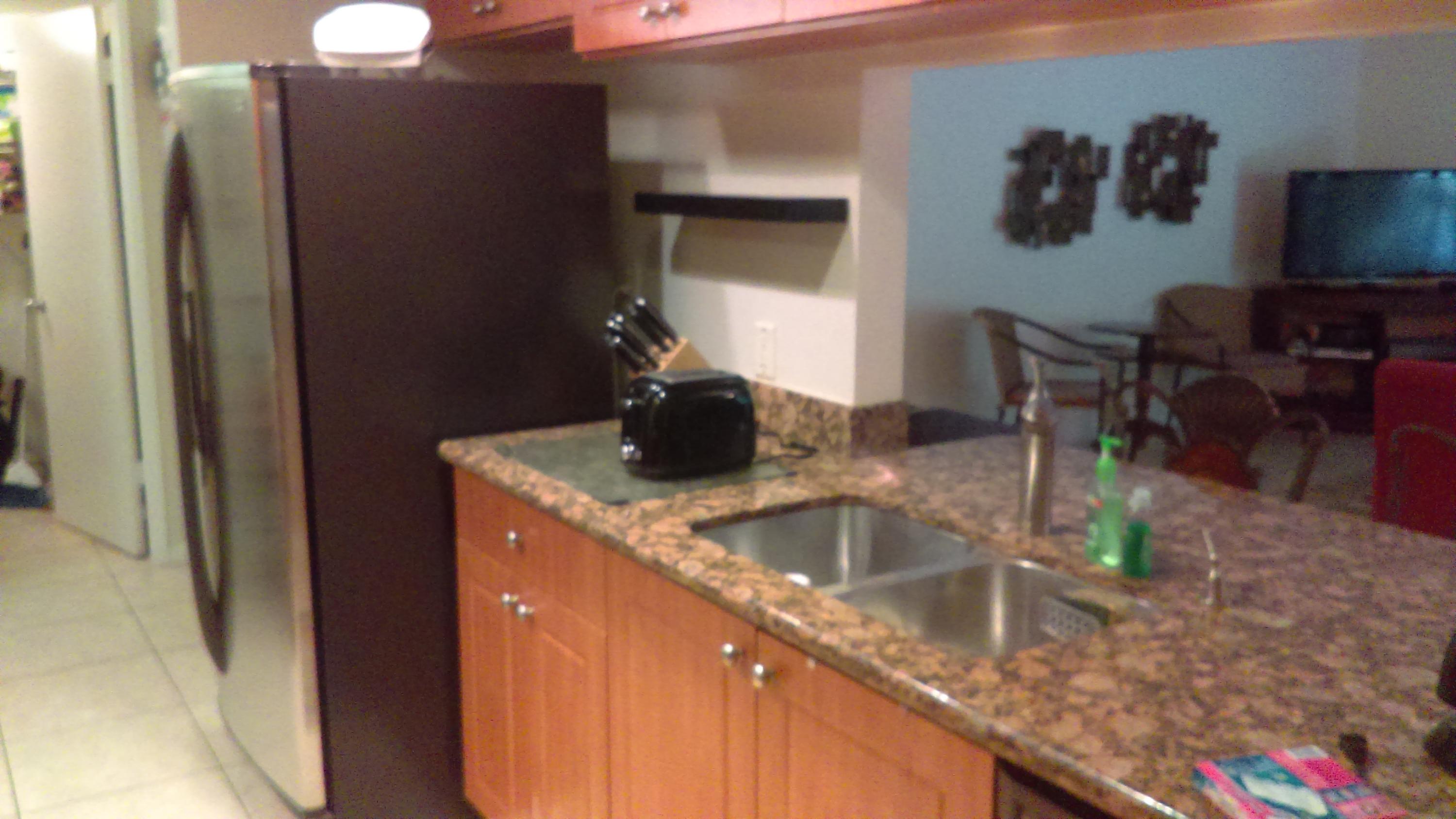820 Lavers Circle, Unit G402 Delray Beach, FL 33444 - Photo 6 of 23 kitchen