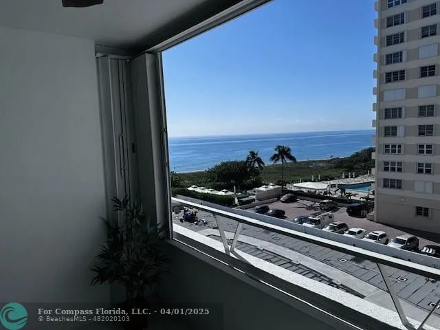 a view of a balcony with an outdoor space