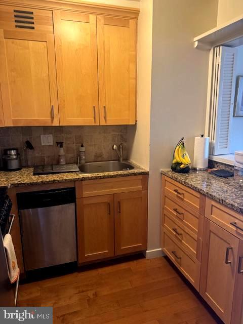 224 West Rittenhouse Square, Unit 1417 Philadelphia, PA 19103 - Photo 9 of 14 a kitchen with stainless steel appliances granite countertop a sink stove and cabinets