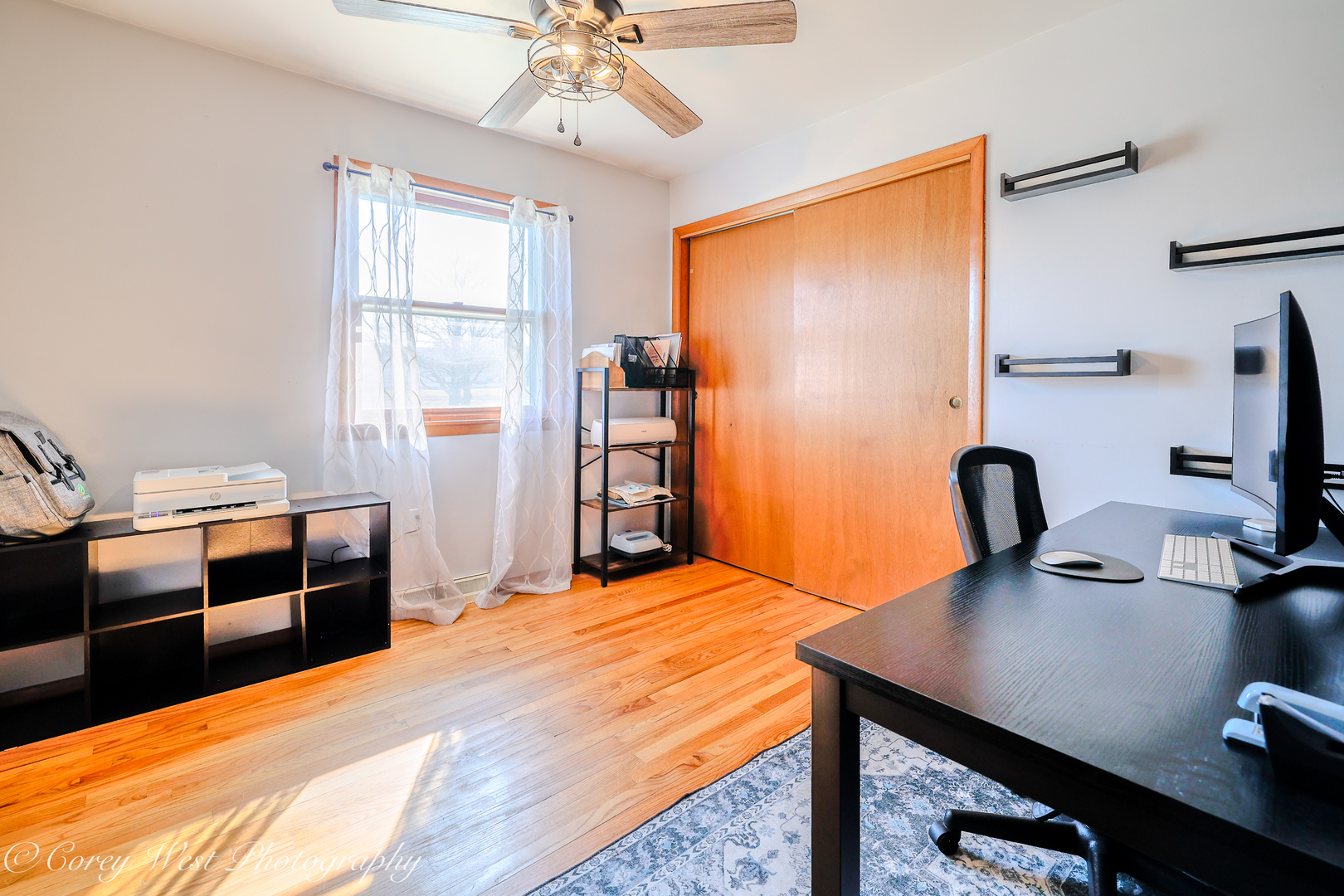 1811 South 7th Street DeKalb, IL 60115 - Photo 21 of 36 a bedroom with a bed and a desk