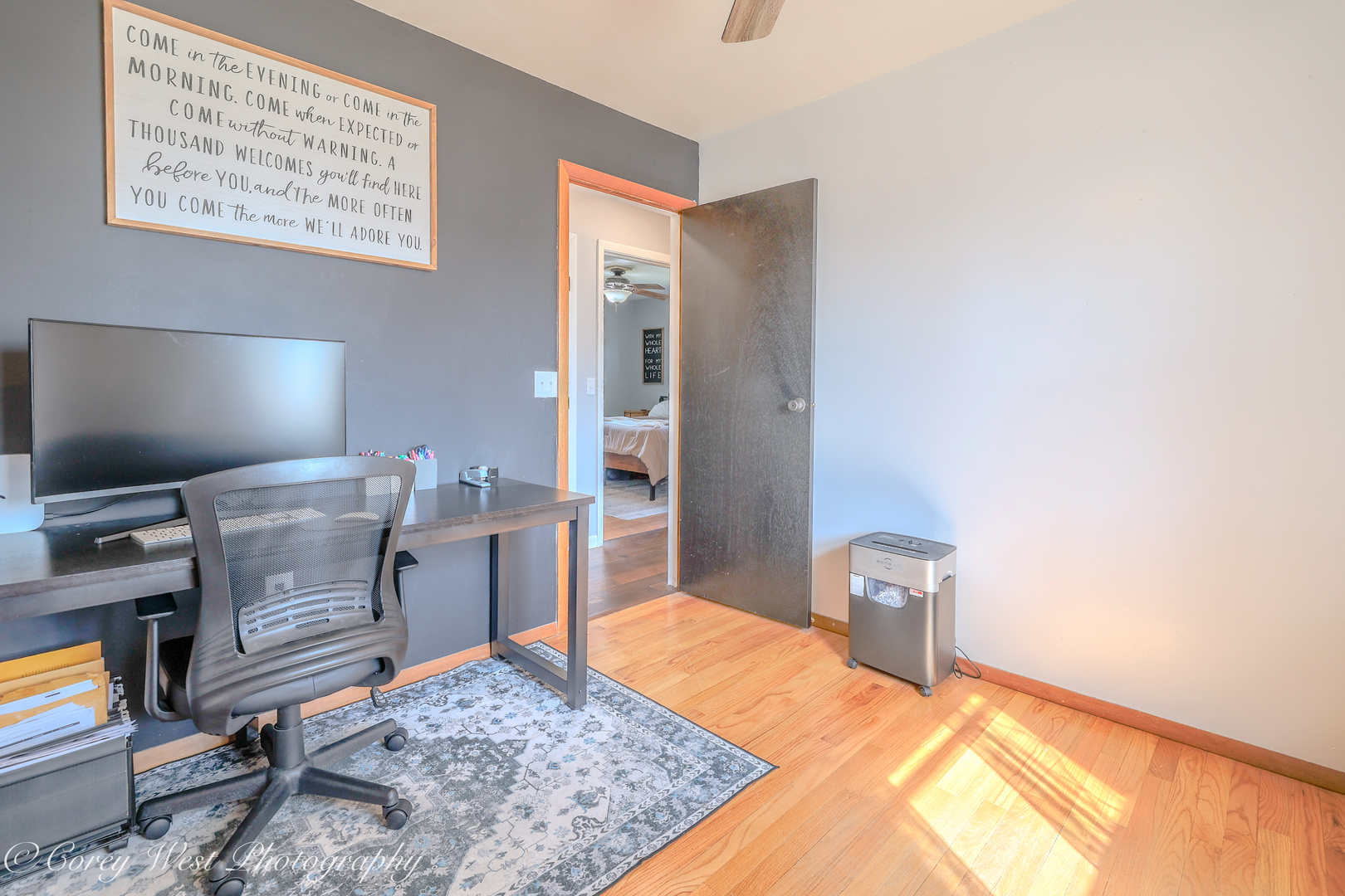 1811 South 7th Street DeKalb, IL 60115 - Photo 22 of 36 a bedroom with a bed and a flat screen tv