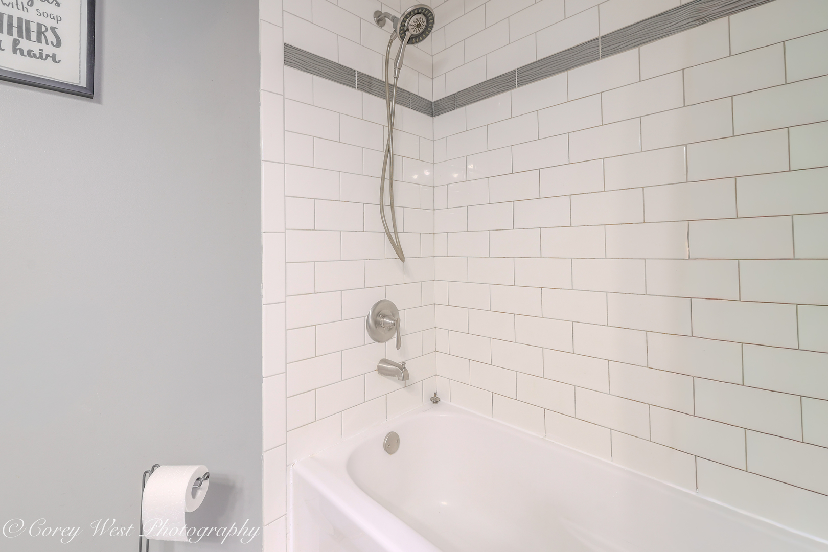 1811 South 7th Street DeKalb, IL 60115 - Photo 24 of 36 a bathroom with a bathtub
