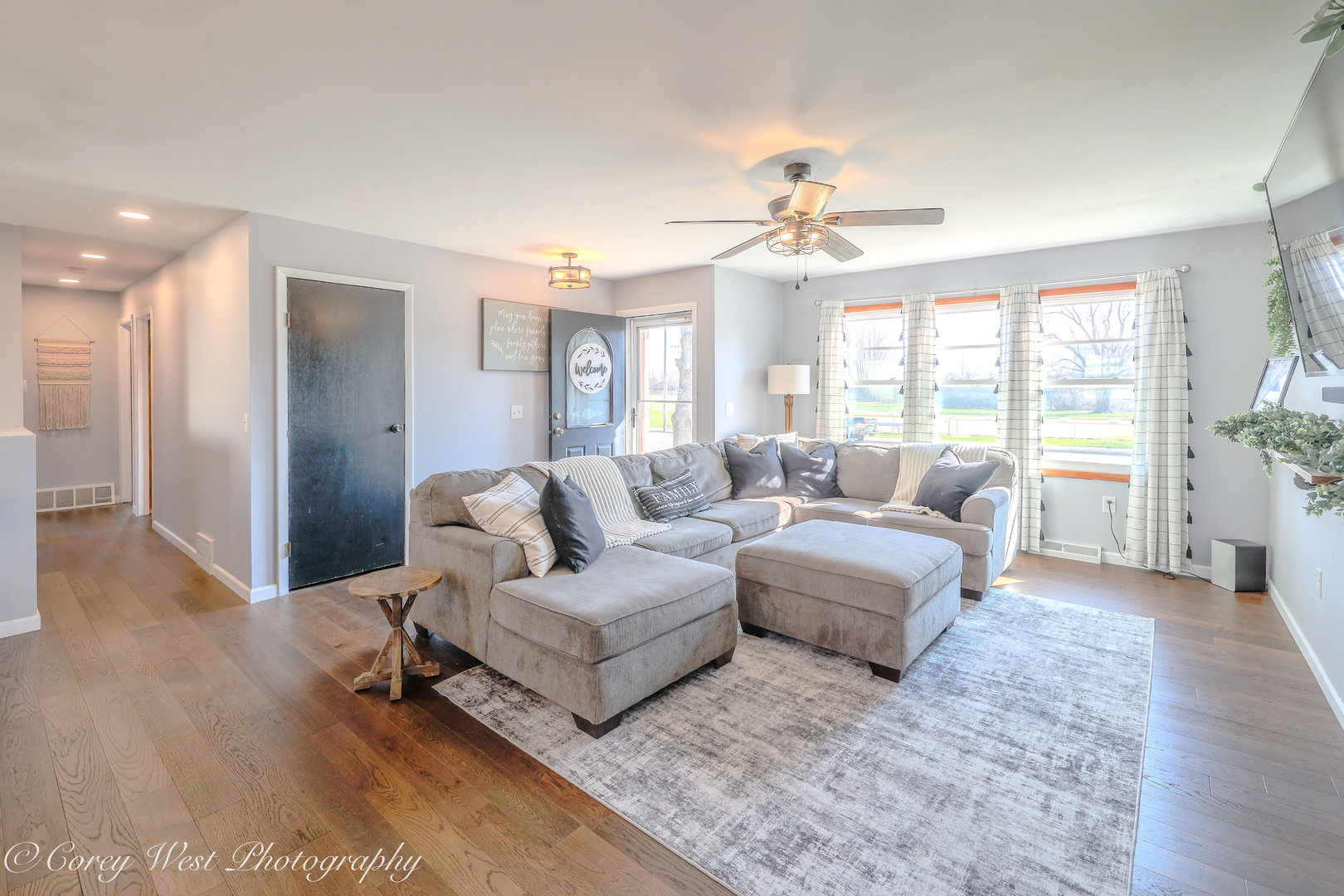 1811 South 7th Street DeKalb, IL 60115 - Photo 5 of 36 a living room with furniture and a chandelier