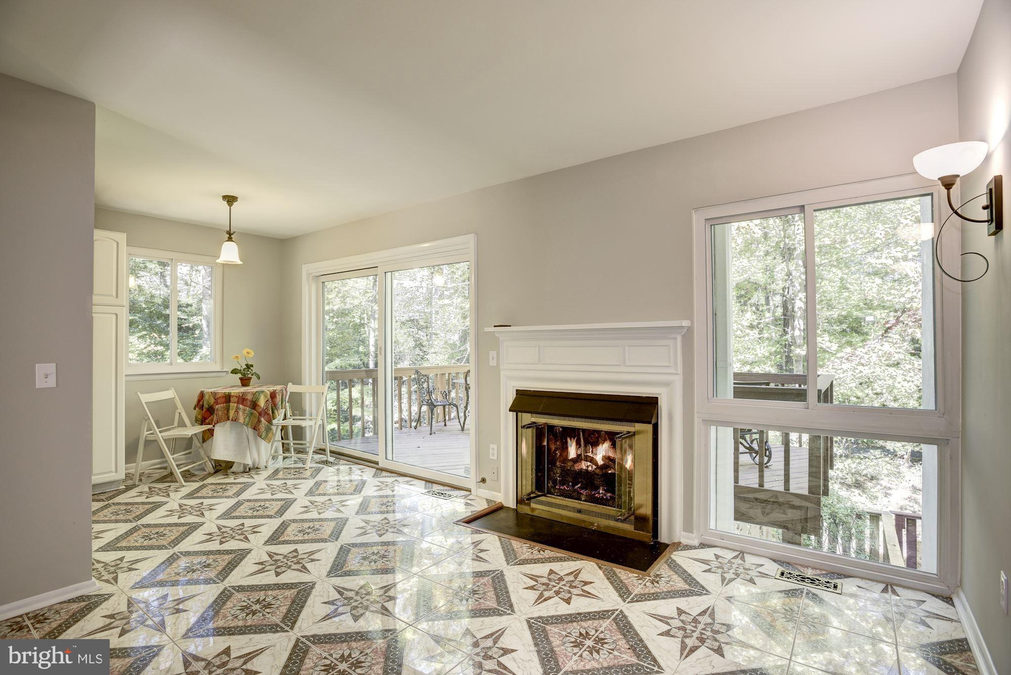 2346 Generation Drive Reston, VA 20191 - Photo 11 of 54 Unique tiled Fam Room w/gas fireplace