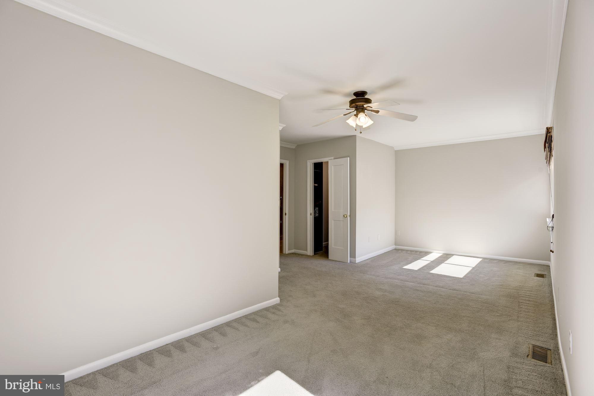 2346 Generation Drive Reston, VA 20191 - Photo 19 of 54 Master lighted ceiling fan + walk-in closet