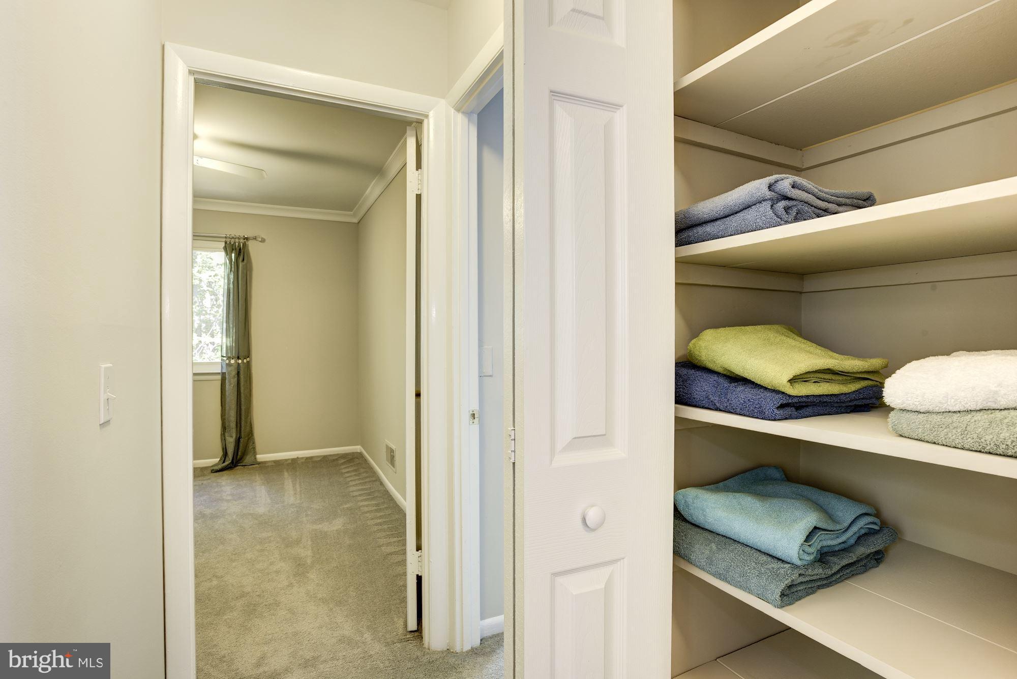 2346 Generation Drive Reston, VA 20191 - Photo 31 of 54 Hallway linen closet walking into second bedroom