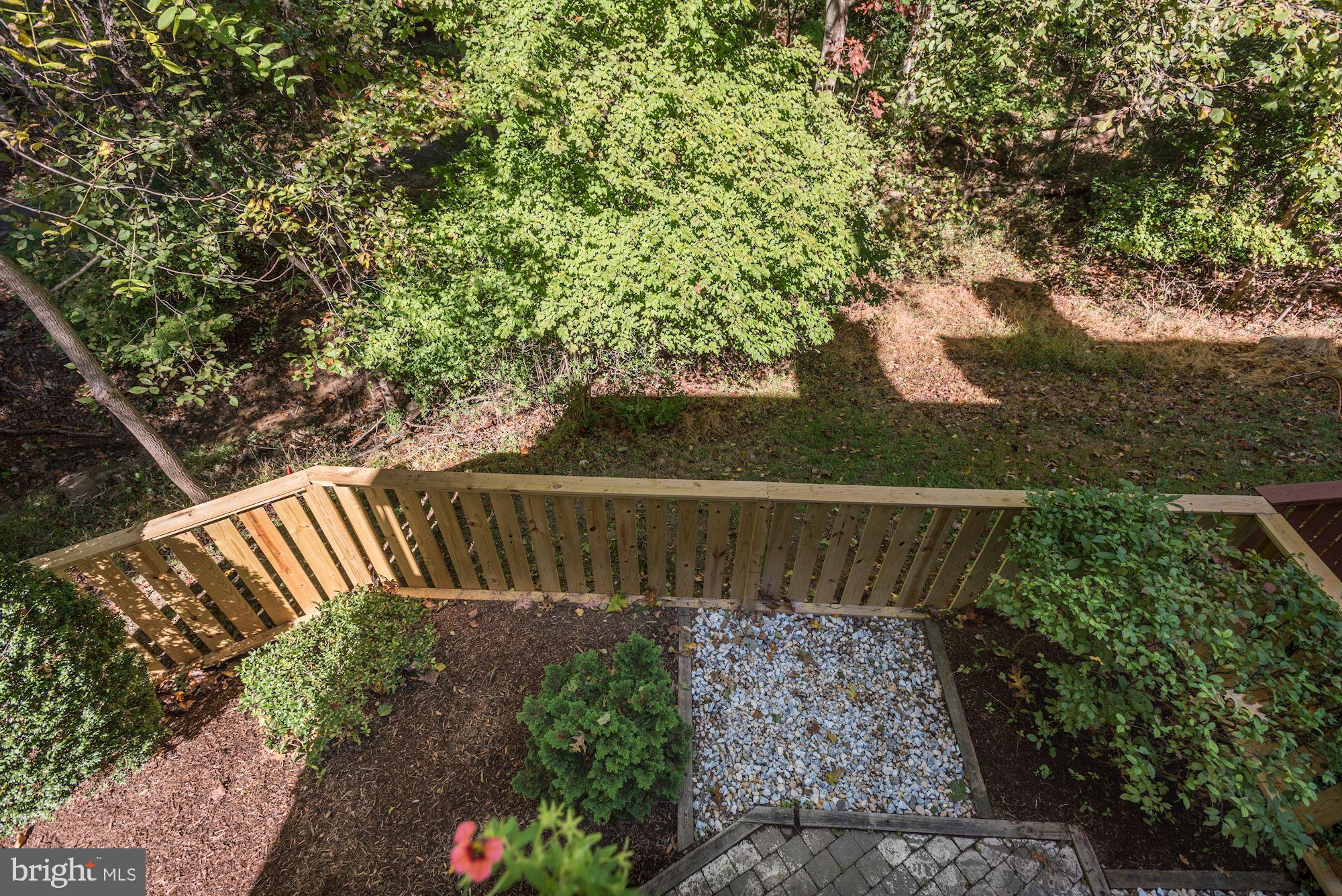 2346 Generation Drive Reston, VA 20191 - Photo 40 of 54 View from deck down to patio off rec room