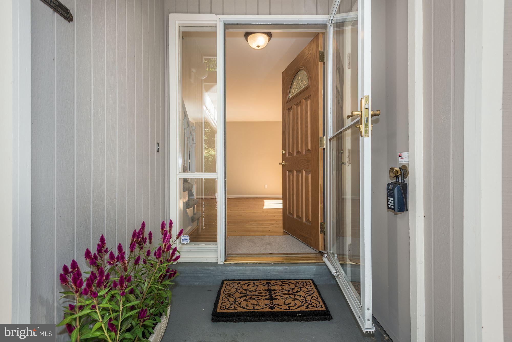 2346 Generation Drive Reston, VA 20191 - Photo 5 of 54 Front door with utility storage closet